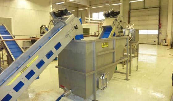 Buffertsilo f&ouml;r skalad poatais f&ouml;re packmaskin